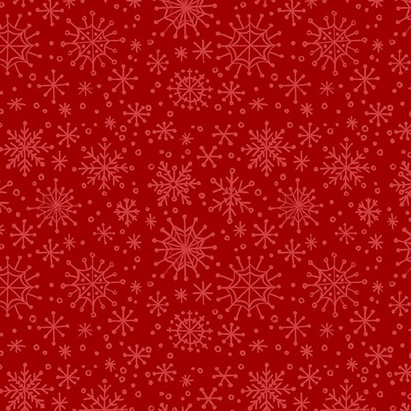 red fabric featuring lighter red snowflakes