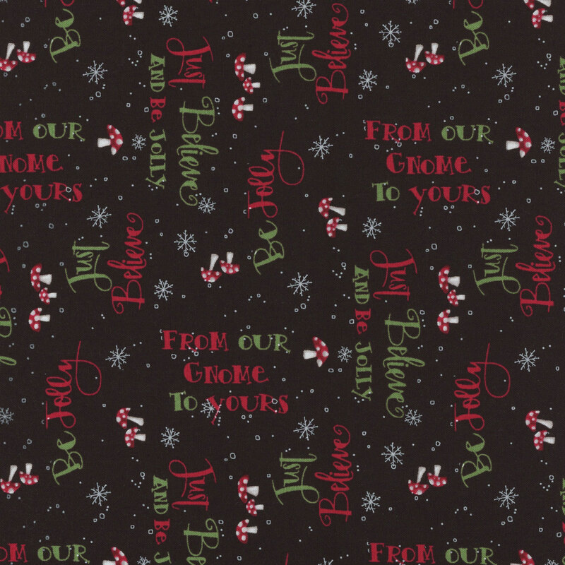 Black fabric with festive phrases, snowflakes, and mushrooms.