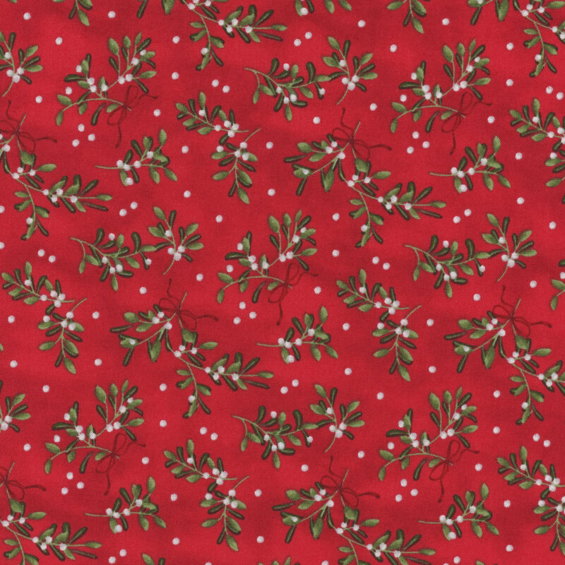 Red fabric with a pattern of mistletoe sprigs.