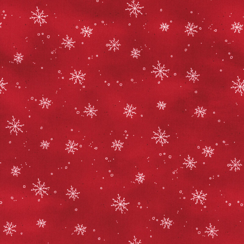 Red fabric with small white snowflakes.