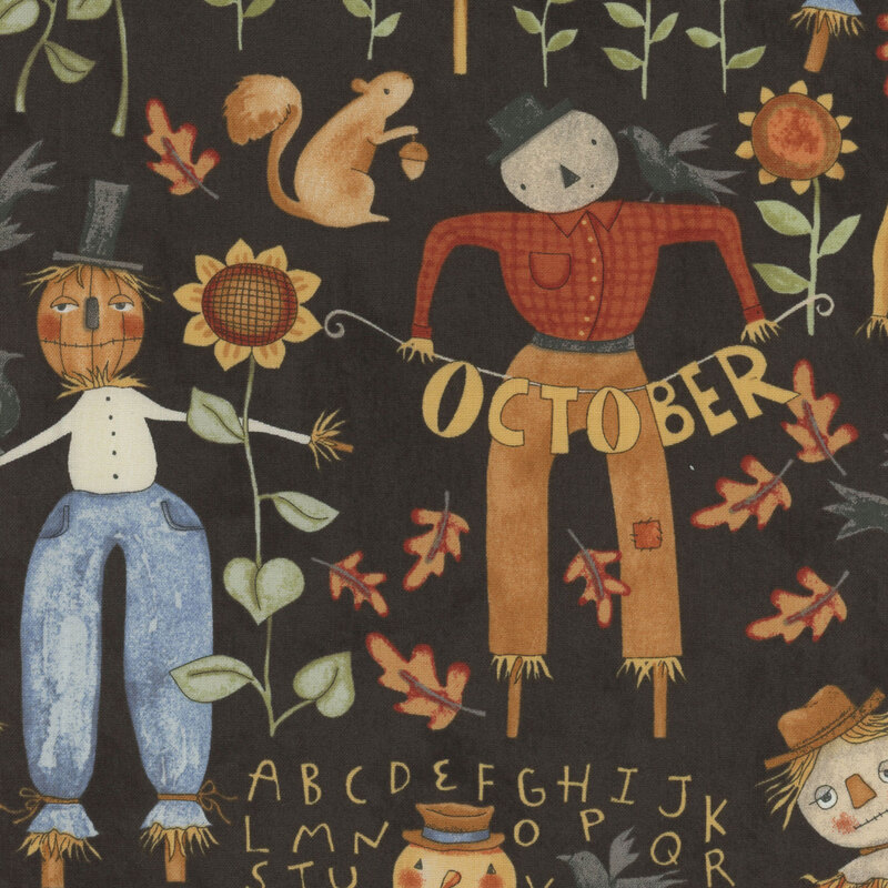 black fabric with scattered autumn motifs, including scarecrows, sunflowers, crows, leaves, pumpkins, and squirrels