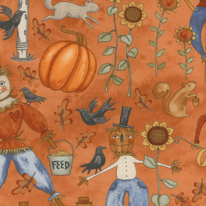 orange fabric with scattered autumn motifs, including scarecrows, sunflowers, crows, leaves, pumpkins, and squirrels