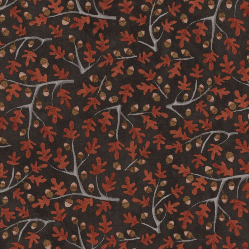 black fabric with scattered oak branches with dark orange leaves and acorns