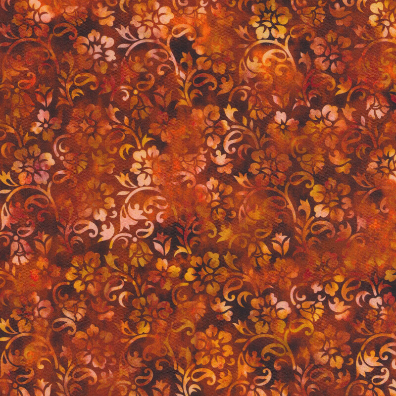 orange and golden yellow mottled fabric featuring a floral design
