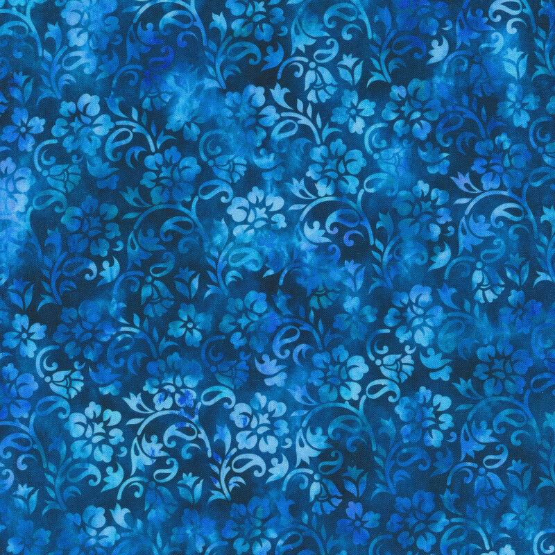 blue mottled fabric featuring a floral design