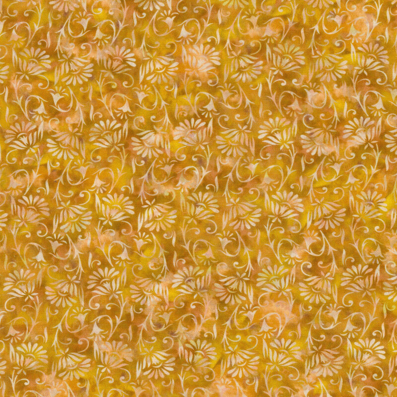 mustard yellow and peach mottled fabric featuring a floral design