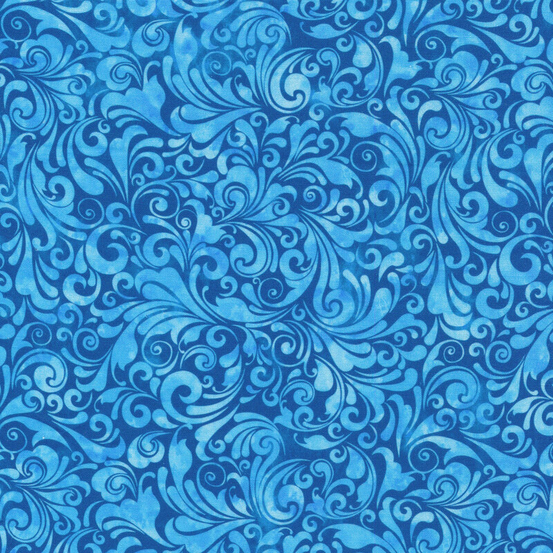 tonal blue mottled fabric featuring a swirled design