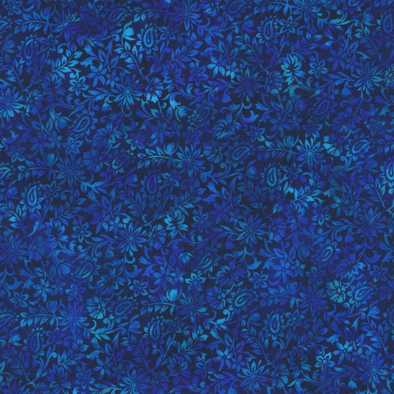 dark blue and black mottled fabric featuring a floral design with hints of light blue
