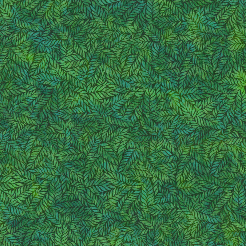green and teal mottled fabric featuring leaves with hints of aqua