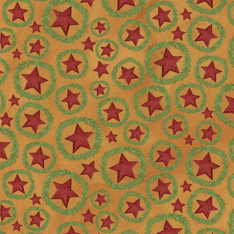 rich golden brown fabric featuring scattered red stars with fir wreaths surrounding them