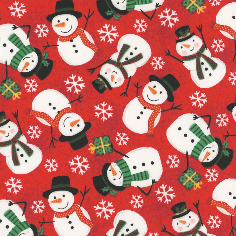 Red fabric with a pattern of snowmen.
