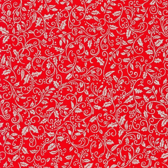 Red fabric featuring metallic silver leaves and vines