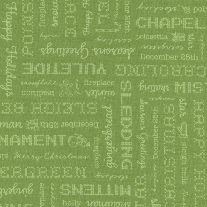 Green tonal fabric with a light green holiday text pattern