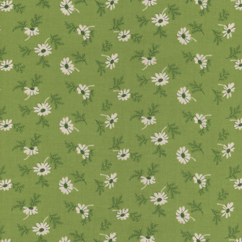 Green fabric with a ditsy daisy pattern 