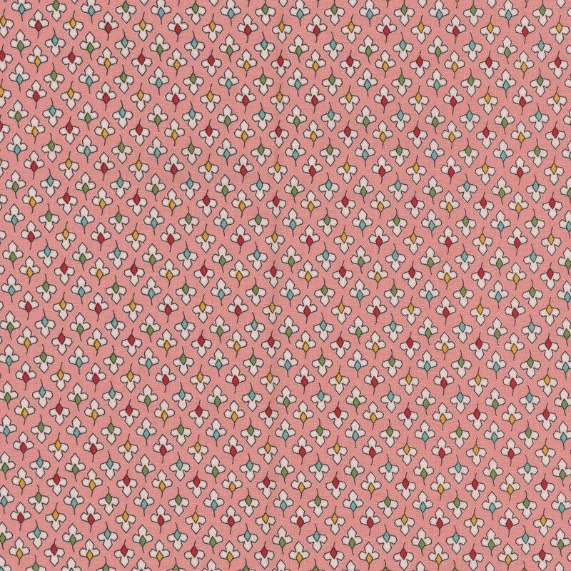 Coral pink fabric with a tossed floral pattern