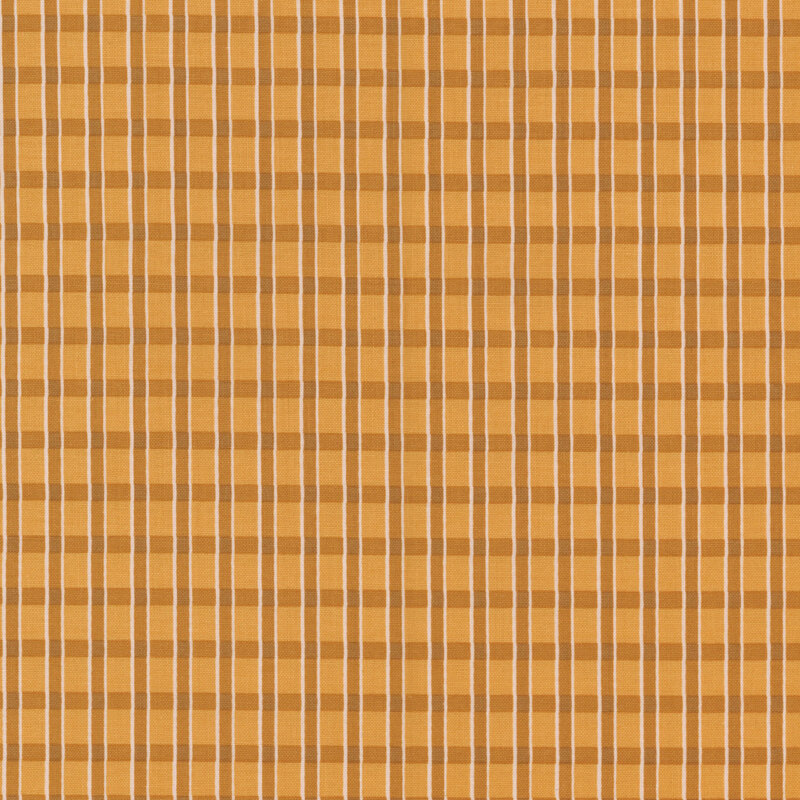 Golden fabric with a tonal gingham pattern