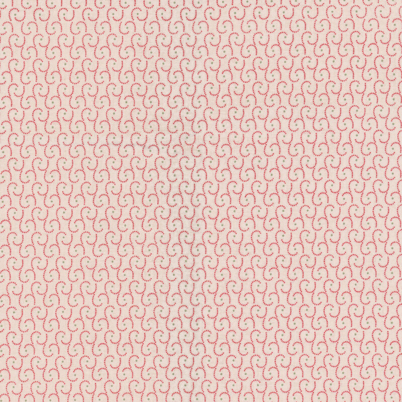 Latte fabric with a red and green swirl pattern