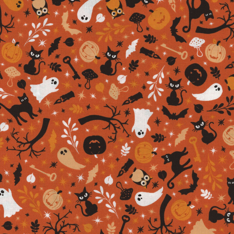 orange fabric featuring cats, jack o'lanterns, ghosts and other halloween themed motifs