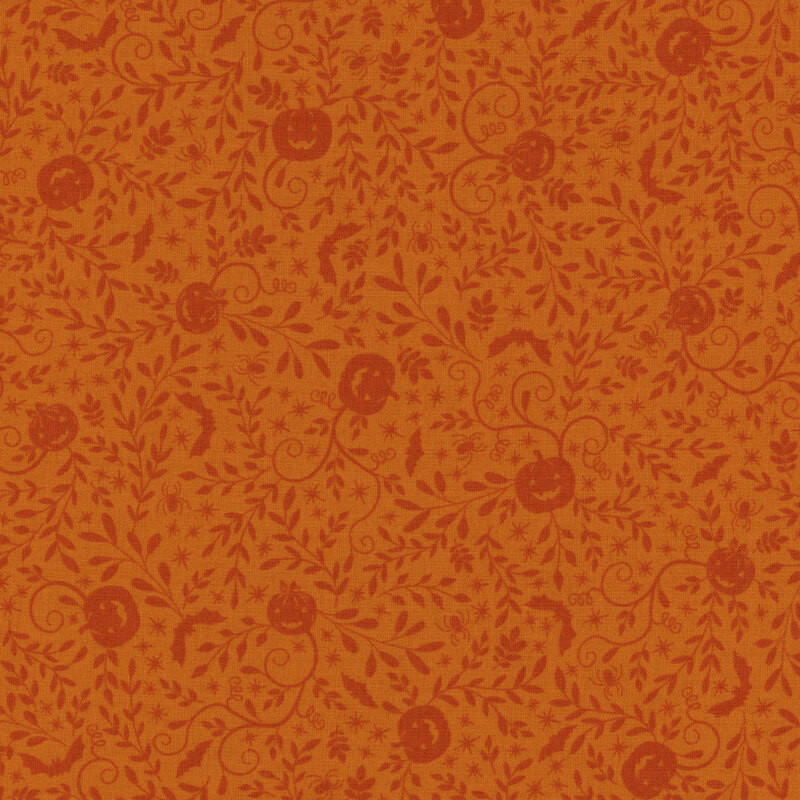orange fabric featuring orange jack o'lanterns, vines leaves and bats
