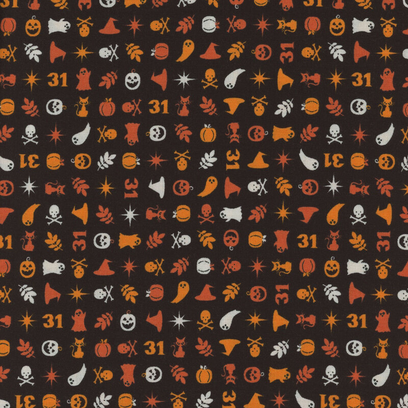 fabric featuring small halloween elements on a black background