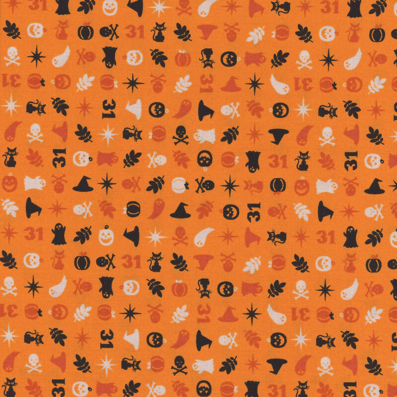 fabric featuring small halloween elements on a orange background
