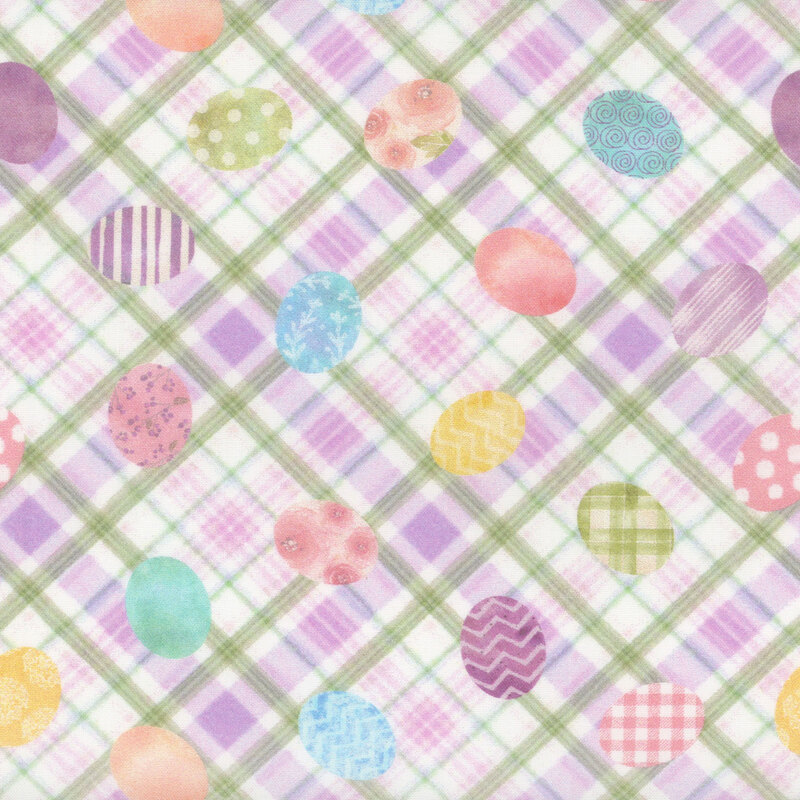 Purple and green plaid fabric with an Easter egg pattern.