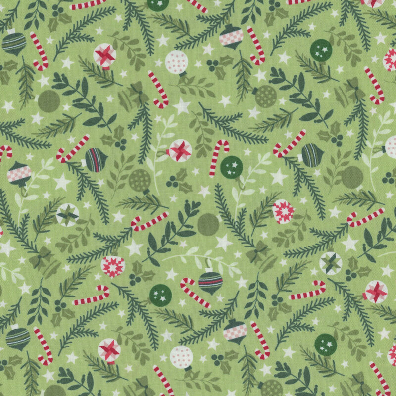 light green fabric featuring leaves, candy canes, and ornaments