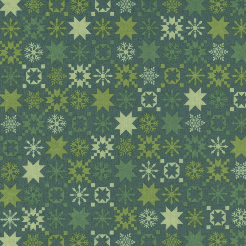 Green fabric featuring various snowflakes