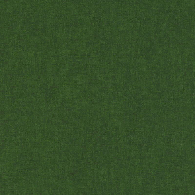 Solid tonal emerald green fabric with light texturing all over