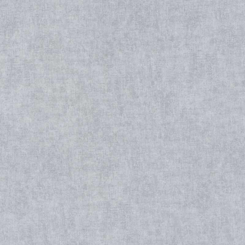 Solid tonal gray fabric with light texturing all over