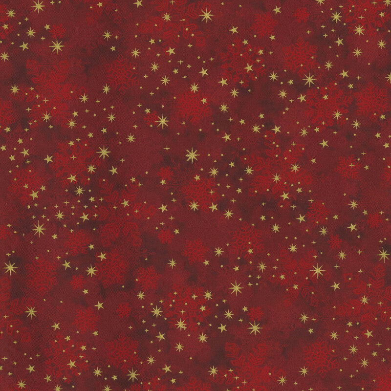 gorgeous mottled red fabric with scattered tonal snowflakes, accented by lovely metallic gold stars