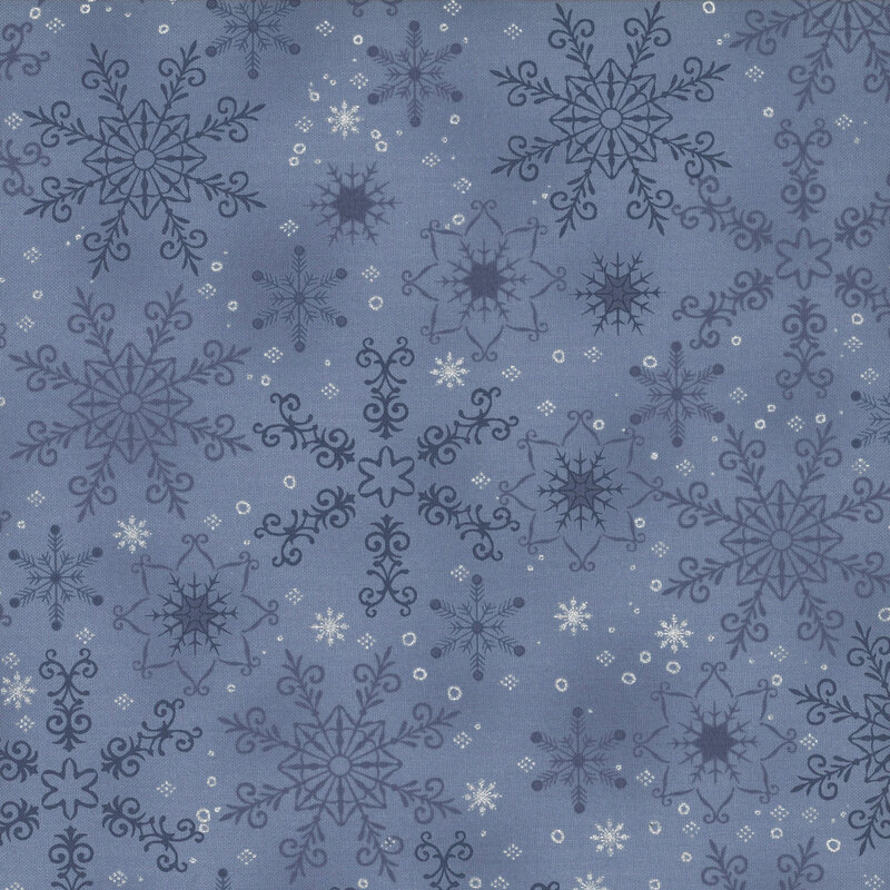 gorgeous denim blue fabric with scattered tonal snowflakes, accented with additional metallic silver snowflakes