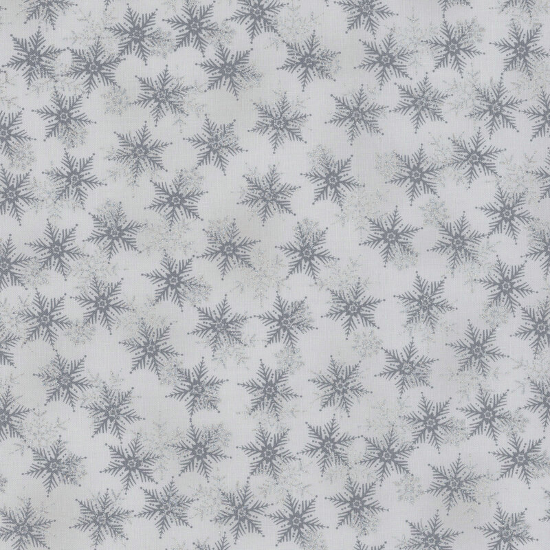 beautiful light gray fabric with scattered tonal and metallic silver snowflakes