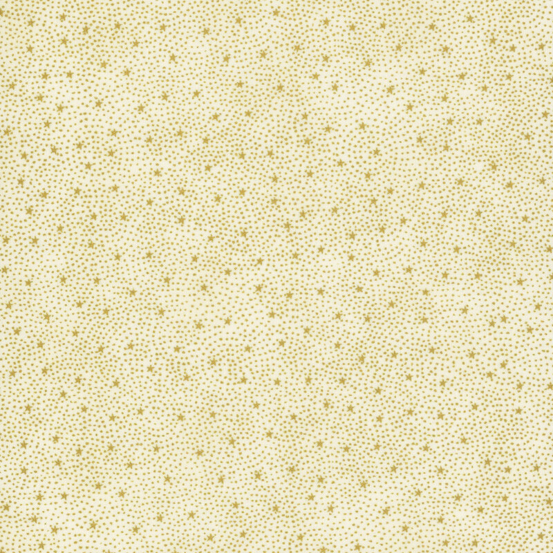 gorgeous cream fabric with tiny scattered metallic gold stars surrounded by pin dots in a radiating pattern