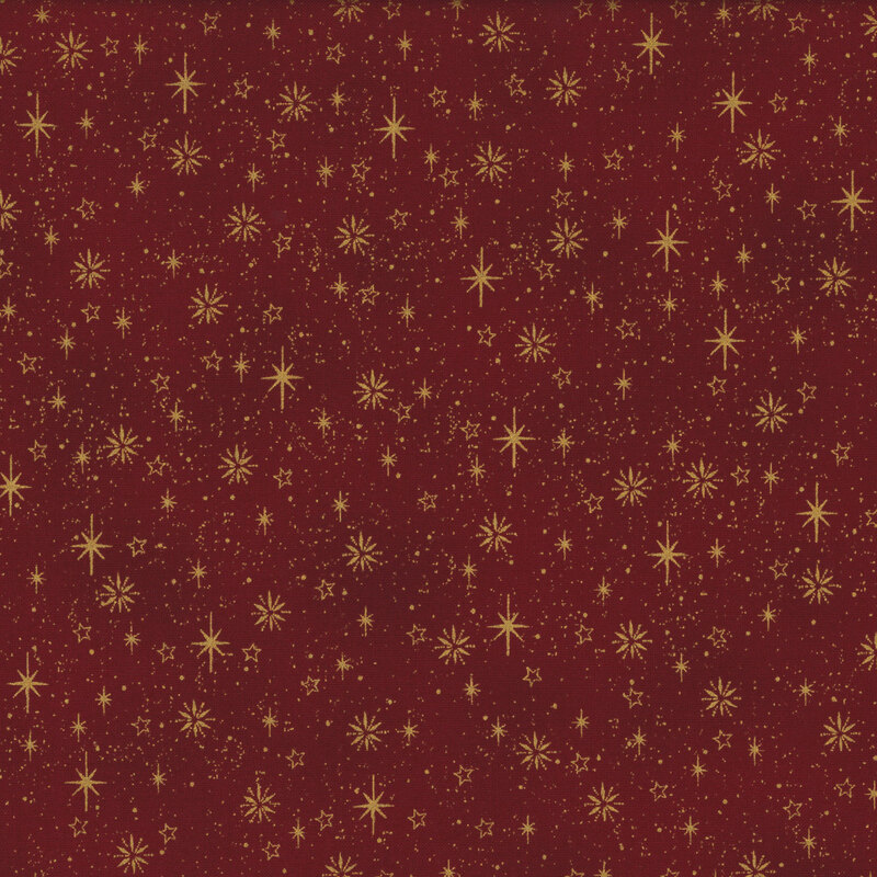gorgeous rich red fabric with scattered metallic gold stars