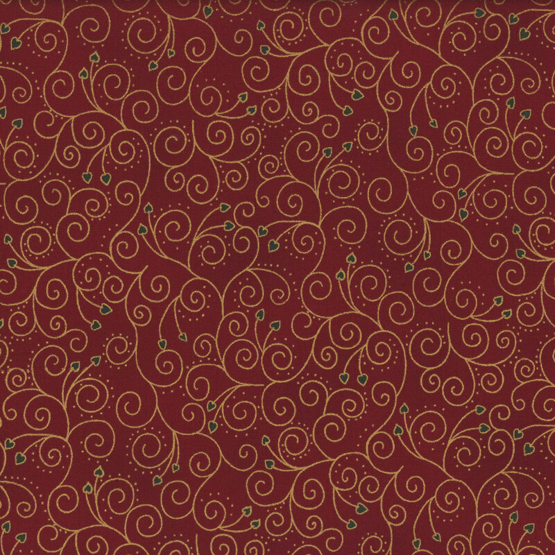 lovely red fabric with metallic gold interwoven swirls, accented by green hearts attached to the ends of some of the scrolls