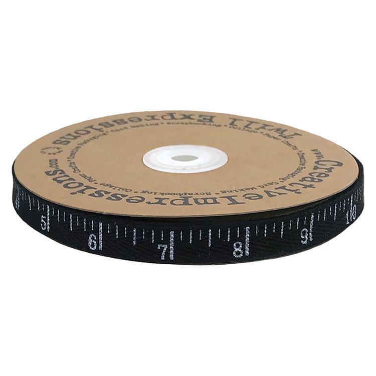A roll of the ruler twill, isolated on a white background