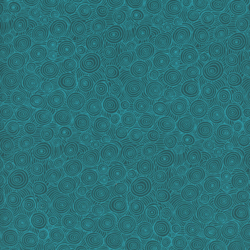 Scan of teal fabric with a swirling pattern
