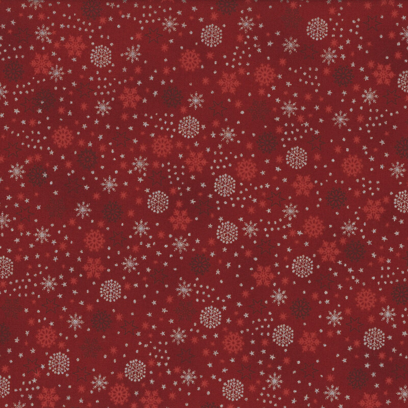 beautiful red fabric with scattered metallic silver and tonal snowflakes, stars, and dots