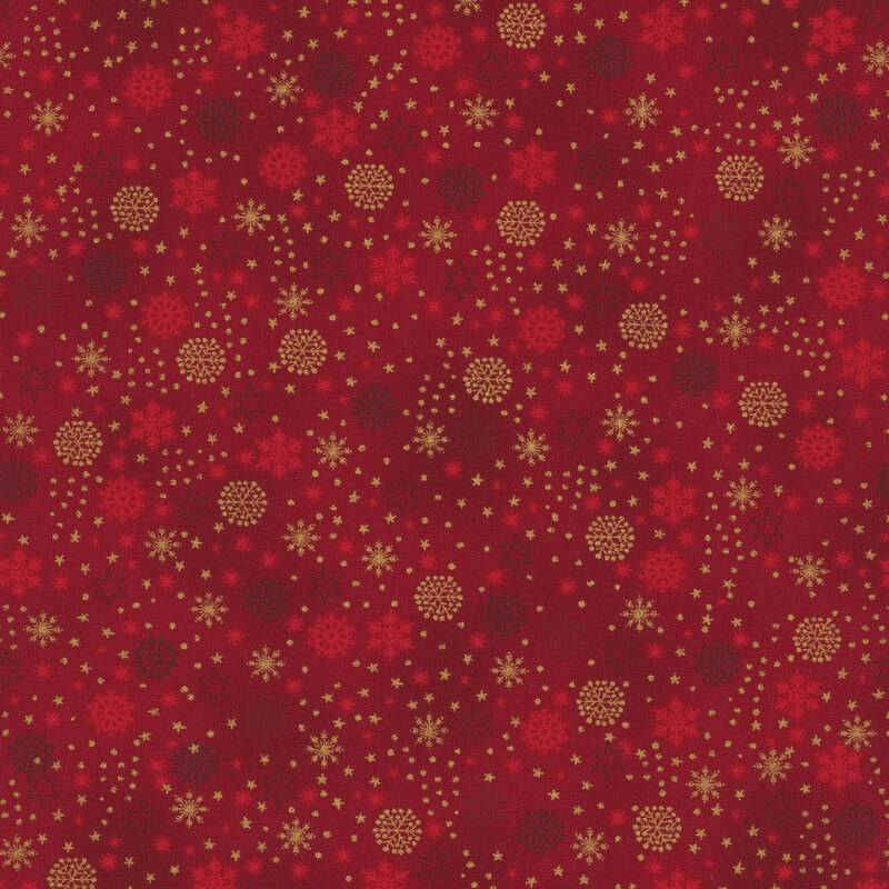 beautiful red fabric with scattered metallic gold and tonal snowflakes, stars, and dots
