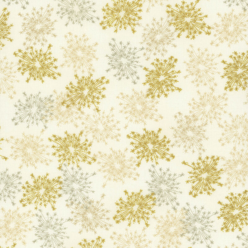 beautiful cream fabric with scattered metallic gold, golden yellow, and gray starbursts