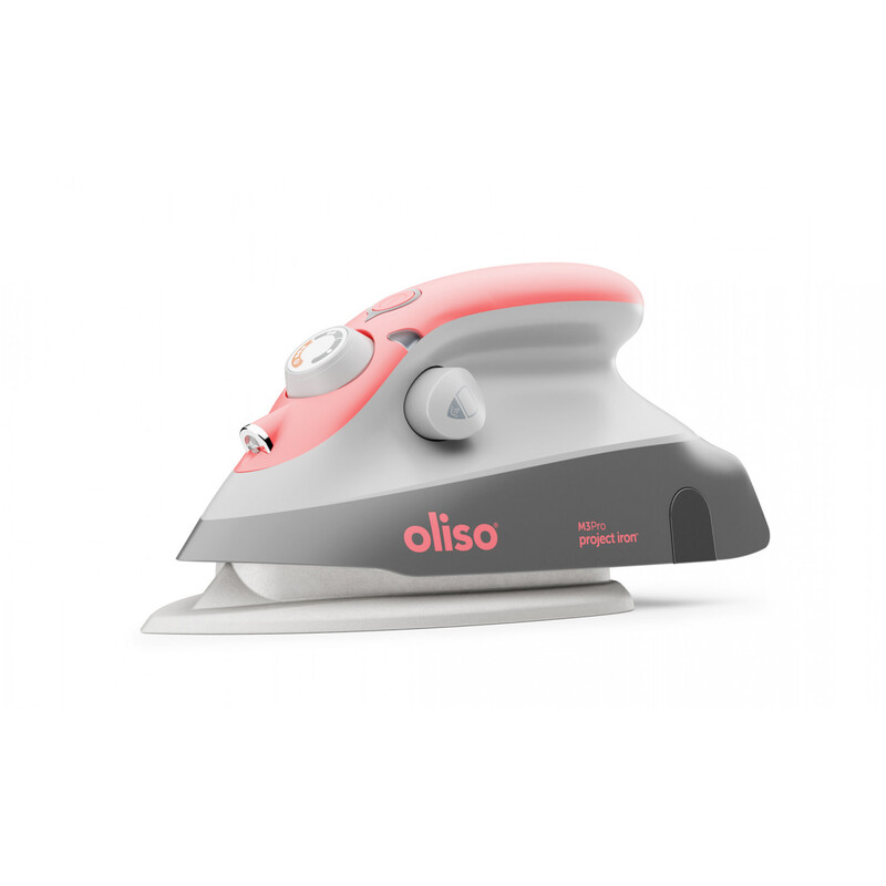 Oliso Mini Iron With Trivet - Coral, isolated on a white background