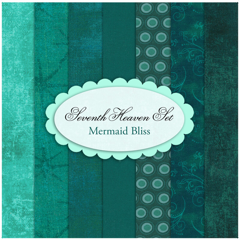 A composite image of all the fabrics included in the Mermaid Bliss set, an array of deep sea teals and aquas!