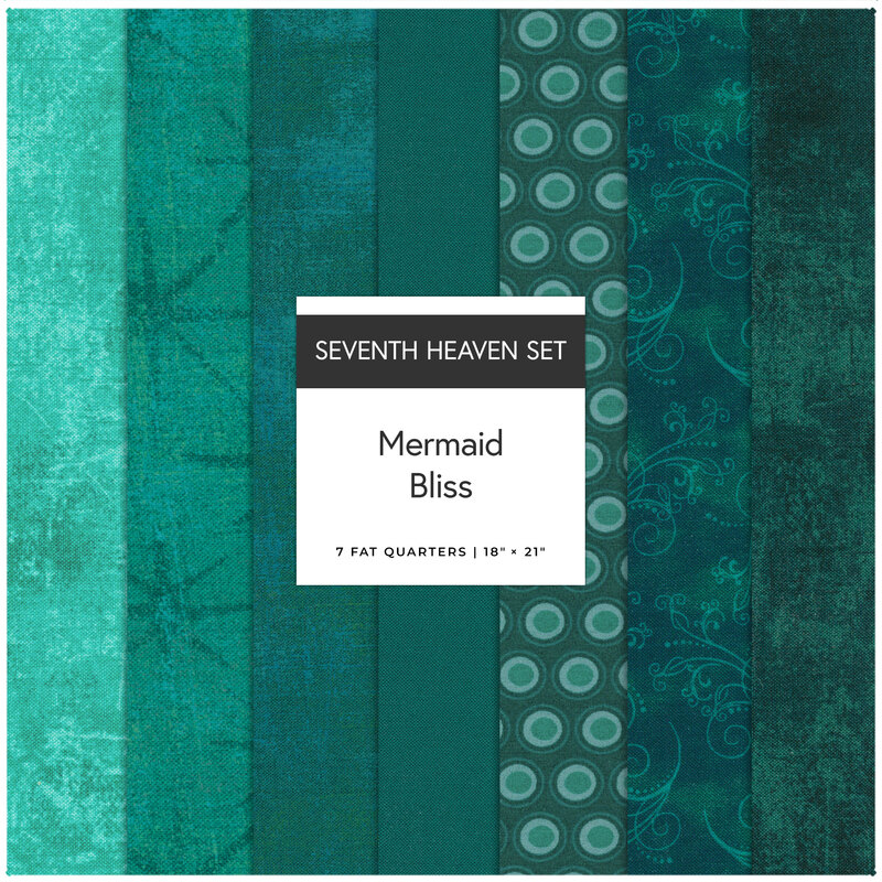 A collage of 7 teal fabrics in the Mermaid Bliss seventh heaven set