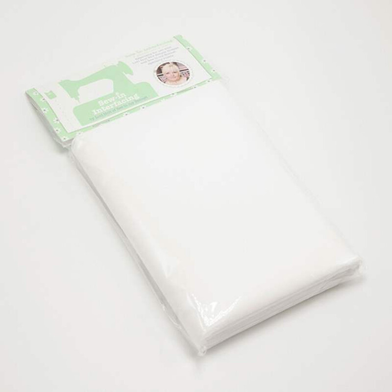 The interfacing in its packaging, bearing a light green label at the top, isolated on a white background
