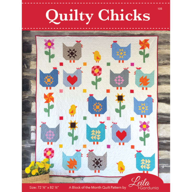 Front of the pattern book showing the completed quilt in bright cheerful colors, staged on a rustic wall