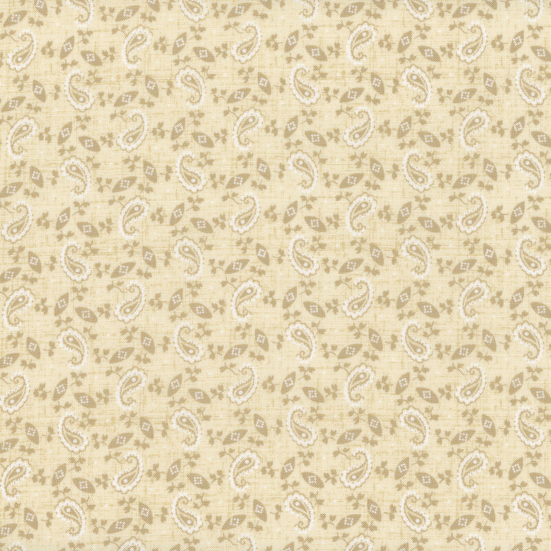 dark cream textured fabric featuring scattered tonal textured vines and paisley motifs