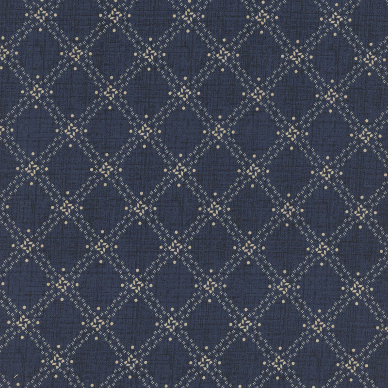 dark denim blue textured fabric featuring a textured cream lattice pattern