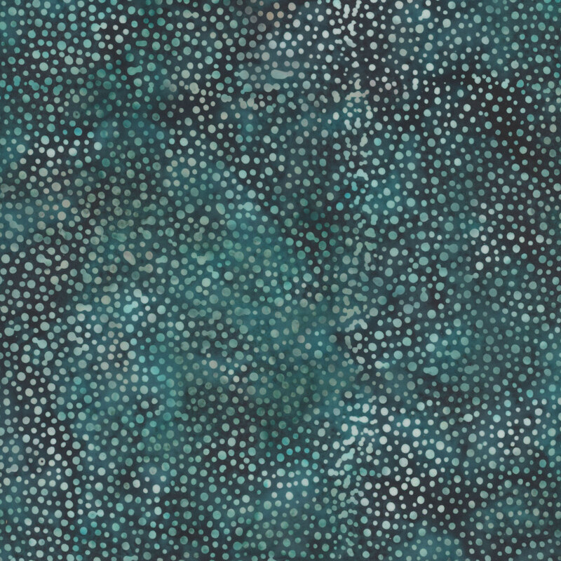 A teal blue batik covered in tonal and white dots of various sizes