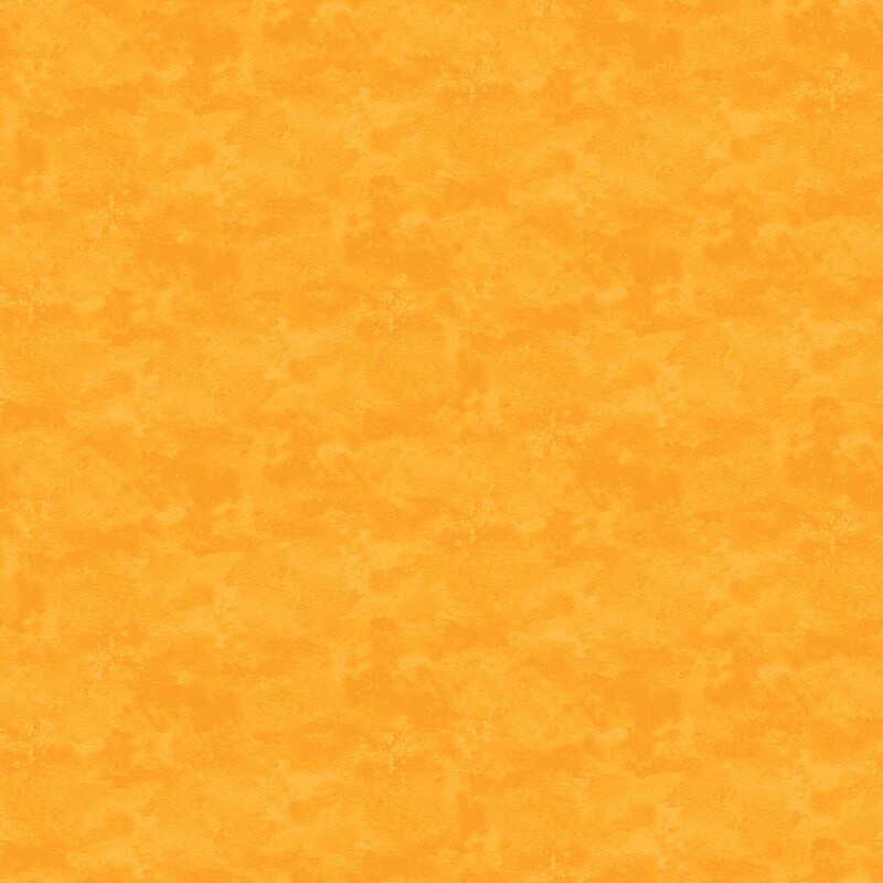 Light yellow orange mottled fabric